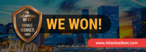 Atlanta's Best Bronze Award 2025 badge with "WE WON!" text, featuring a skyline backdrop, representing EarthTran Global Limousine's recognition for excellence in transportation services.